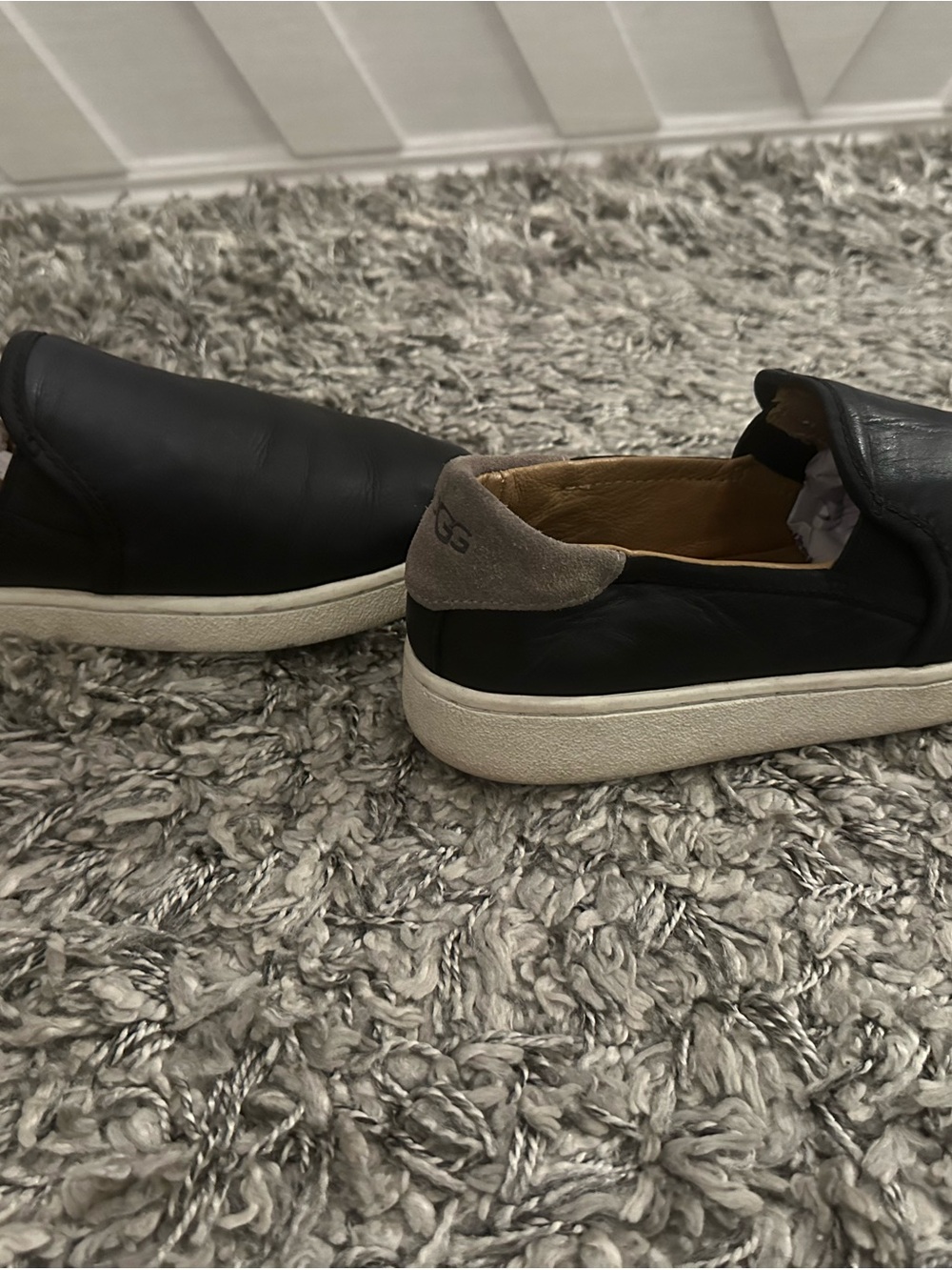 Women’s Black Leather Slip-On Sneakers with Suede Heel Accent